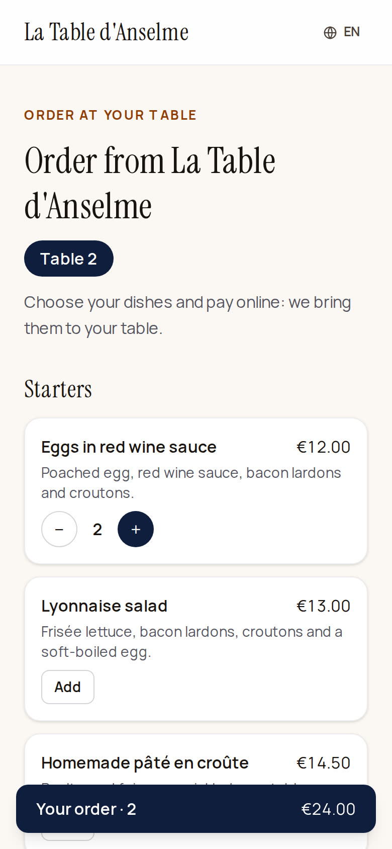 Table ordering on a phone: the "Table 2" badge at the top, the dish added twice with the − 2 + buttons, and the "Your order · 2 — €24.00" bar.